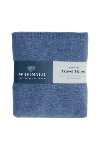 Blue travel throw blanket with McDonald New Zealand Knitwear branding on a white background