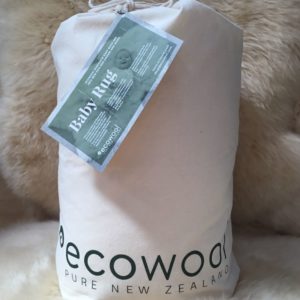 Ecowool baby sheepskin rug in calico bag
